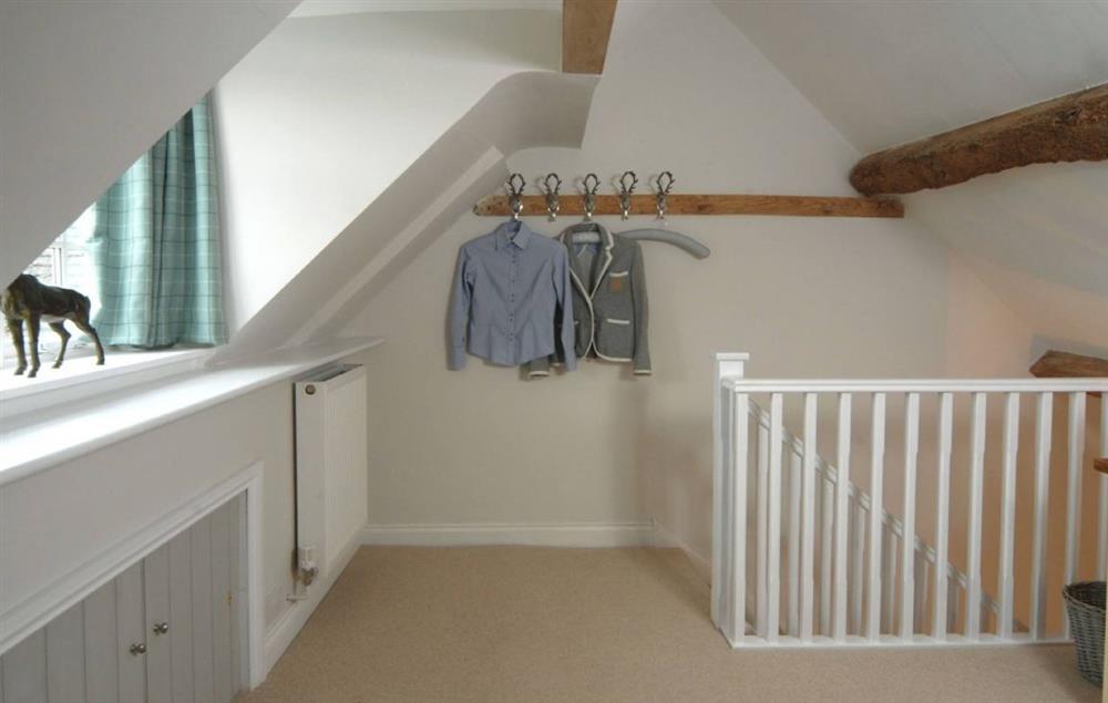 the hanging space in the dressing area at Diamond Cottage, Chipping Campden