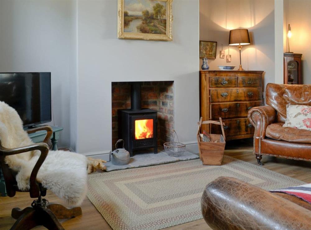 Homely living area with wood burner at Dick n Liddys Cottage in Gargrave, near Skipton, North Yorkshire