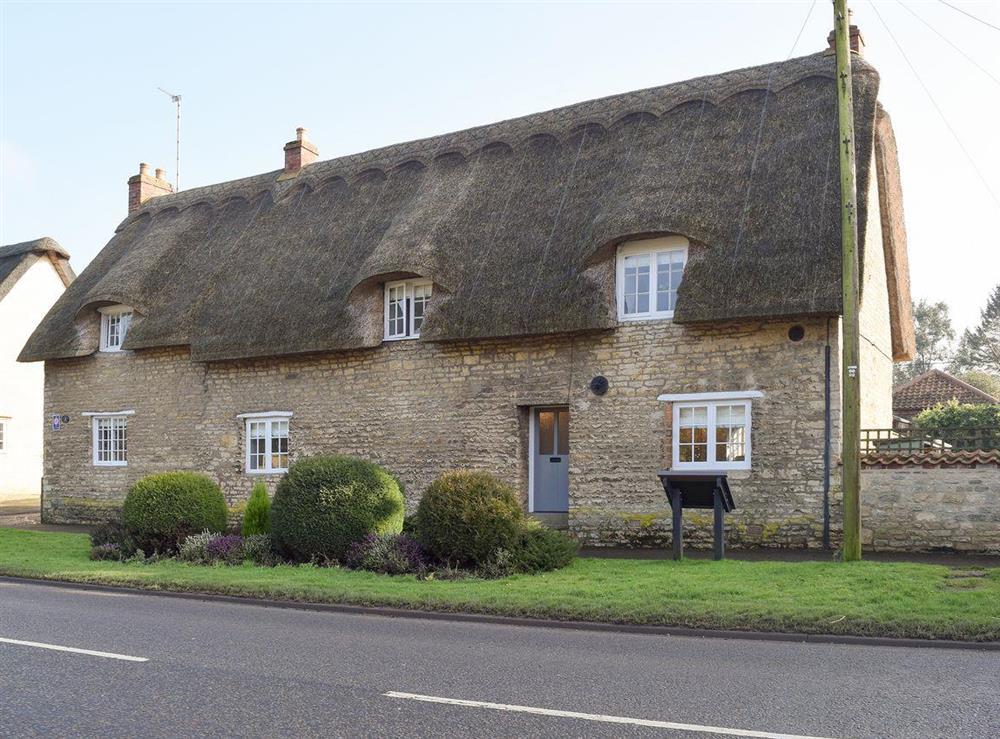 Beautiful grade II listed thatched holiday cottage at Dicks Cottage in Cottesmore, near Oakham, Rutland, Norfolk