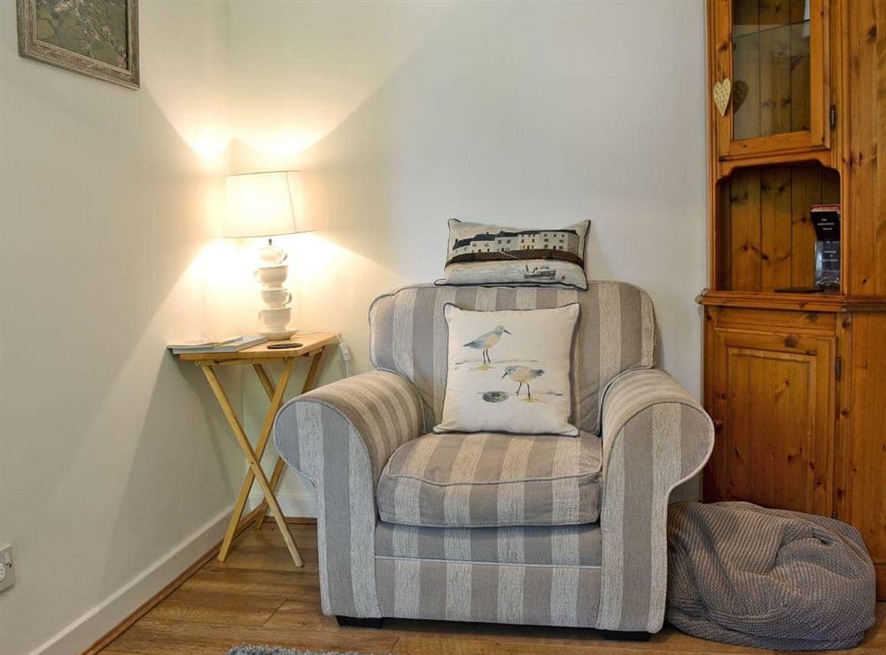 Beautifully presented living room with wood burner (photo 4) at Didfa in Llangoed, near Beaumaris, Gwynedd