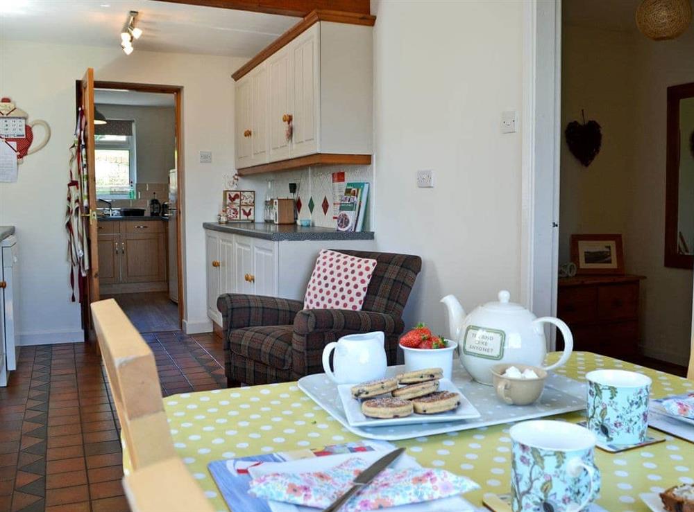 Immaculately presented kitchen with breakfast area (photo 2) at Didfa in Llangoed, near Beaumaris, Gwynedd