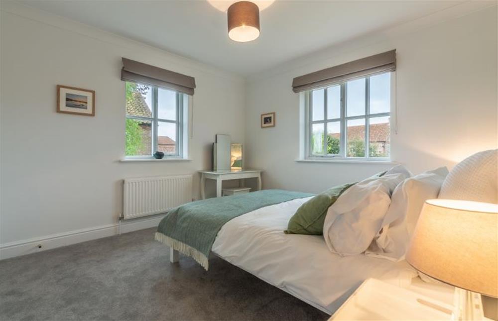 First floor: Dual aspect master bedroom at Diggers Rest, Burnham Market  near Kings Lynn