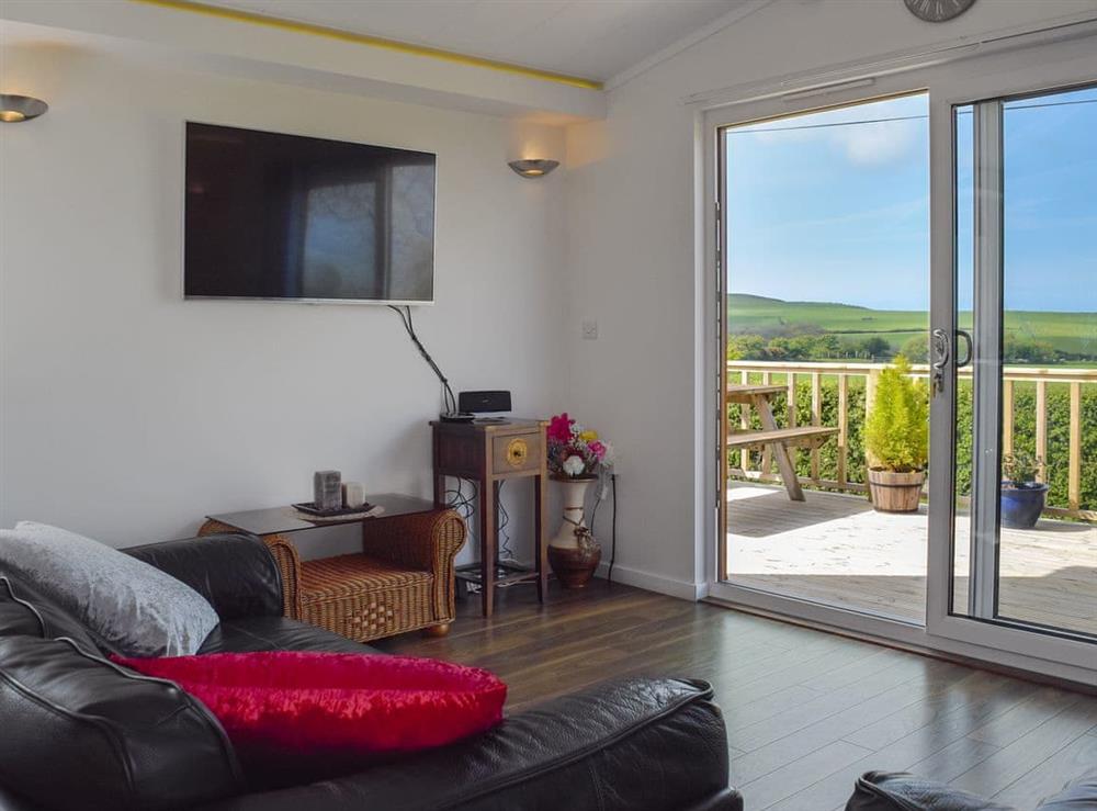 Delightful living space with patio doors to the decking at Tranquillity, 