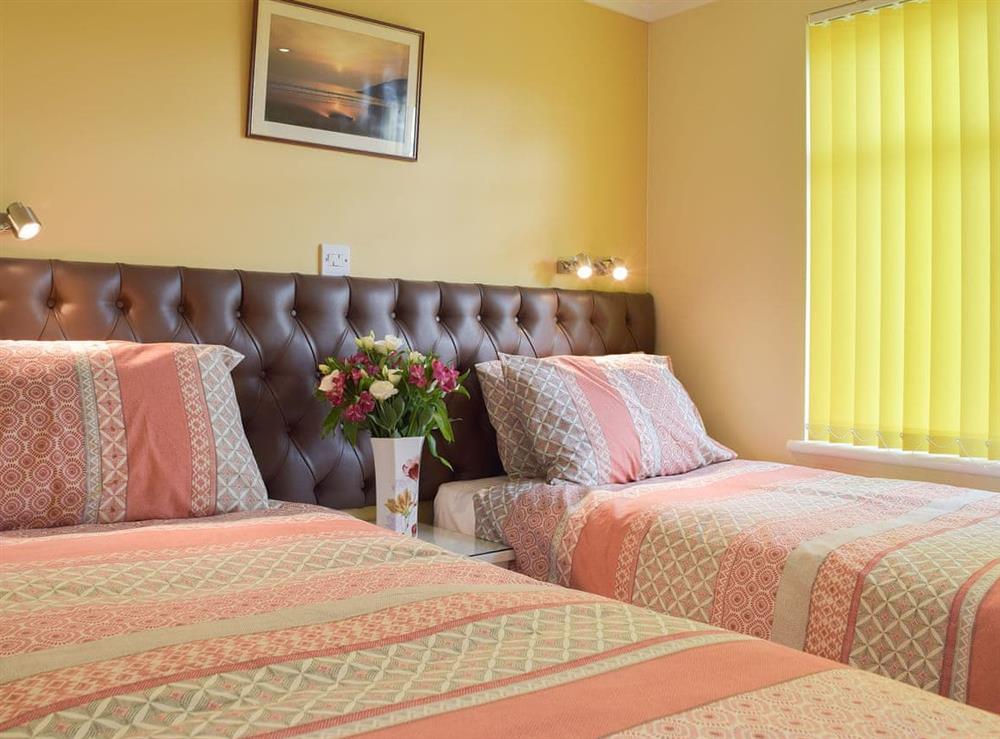 Well-appointed twin bedroom at Tranquillity, 