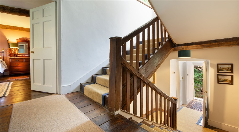 The stairs and first-floor landing at Dinefwr Home Farm in Llandeilo, Carmarthenshire