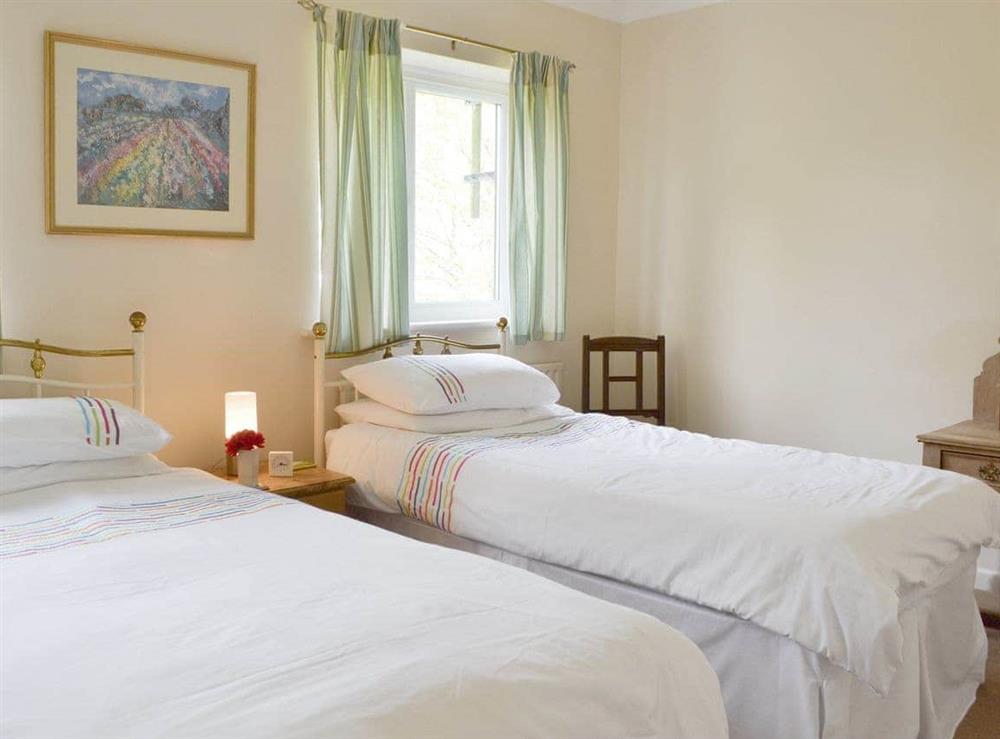 Comfortable twin bedroom at Dinsdale in Rustington, near Worthing, West Sussex
