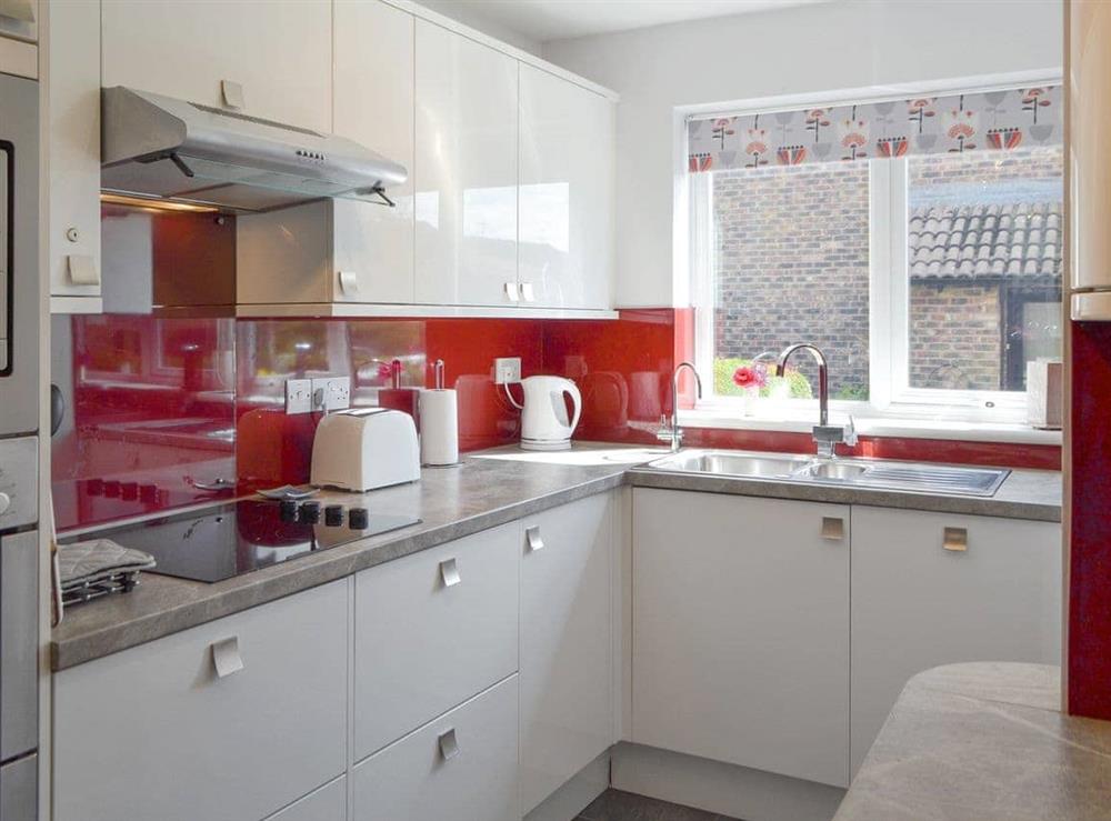 Well-appointed fitted kitchen at Dinsdale in Rustington, near Worthing, West Sussex