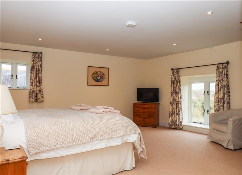 One of the 3 bedrooms at Dishcombe Cottage, Sticklepath