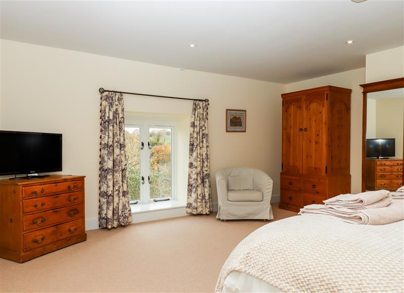 This is a bedroom (photo 2) at Dishcombe Cottage, Sticklepath