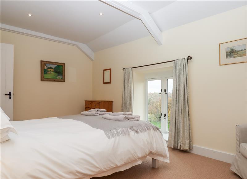 This is a bedroom (photo 4) at Dishcombe Cottage, Sticklepath