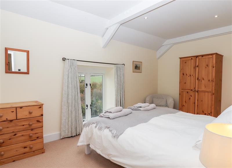 This is a bedroom (photo 5) at Dishcombe Cottage, Sticklepath