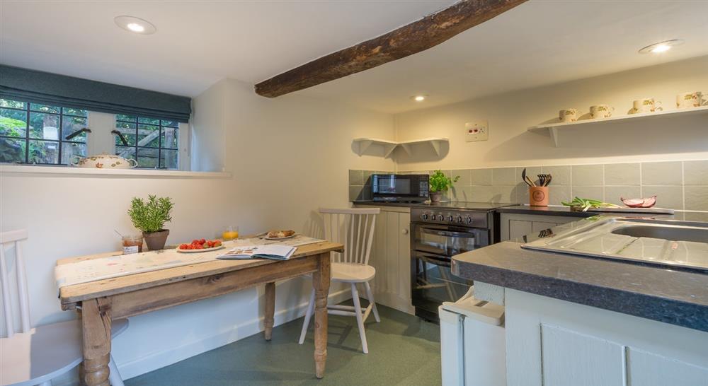 The kitchen and dining area at Diston's Cottage in Broadway, Gloucestershire