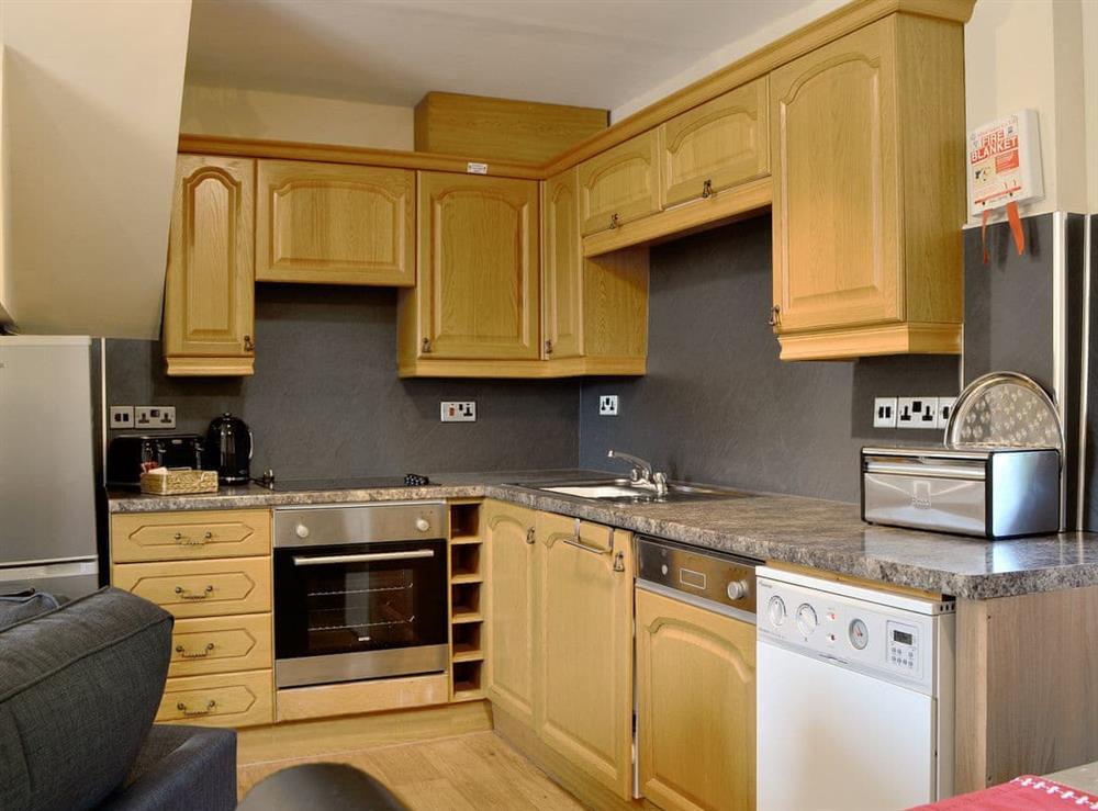 Well equipped kitchen area at Brackendale, 