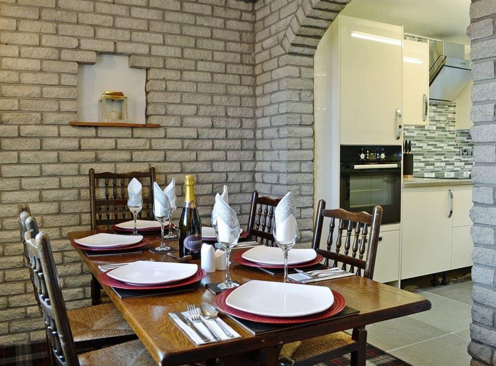 Attractive dining area at Grajo Cottage, 