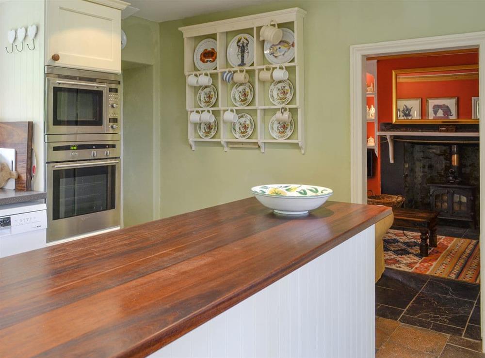 Kitchen area adjoins both living room and conservatory at Dol Y Clochydd in Llanfachreth, near Dolgellau, Gwynedd