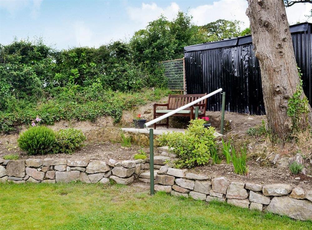 Enclosed lawned garden with patio and garden furniture (photo 2) at Dolfran Bach in Dolwen, near Betws-yn-Rhos, Abergele, Clwyd