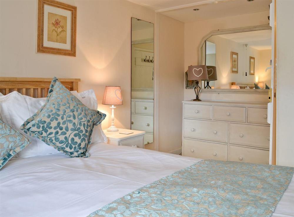 Double bedroom at Dolls Cottage in Bourton-on-the-Water, Gloucestershire