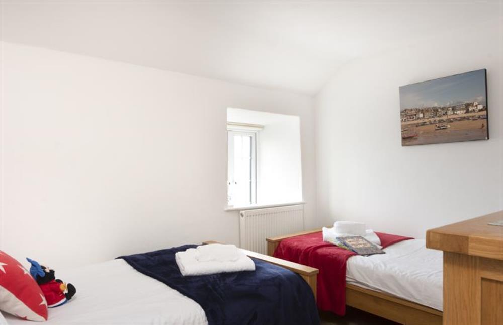 Bedroom two with twin 3’ single beds at Dolor Cottage, Coverack