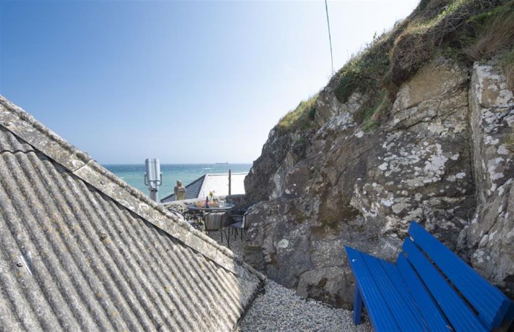 Dolor Cottage, Coverack. Please take care on your approach to the sitting area around the corner of this roof!