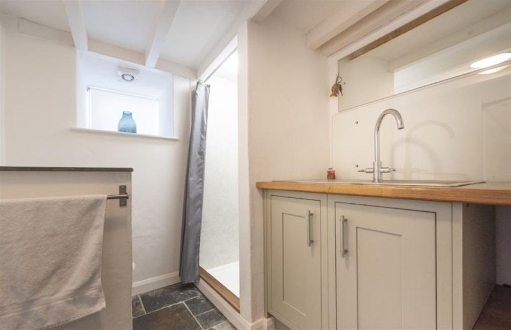 The ground floor shower and utility room at Dolor Cottage, Coverack
