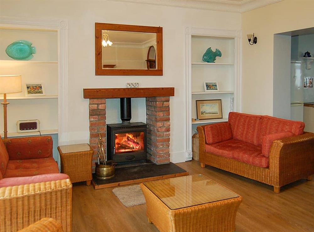 Living room/dining room at Dolphin Beach House in Tywyn, Gwynedd