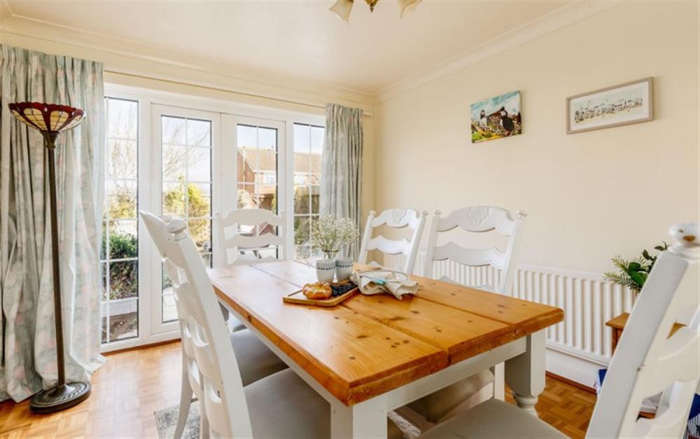 Enjoy the living room at Dolphin Cottage in Barton On Sea