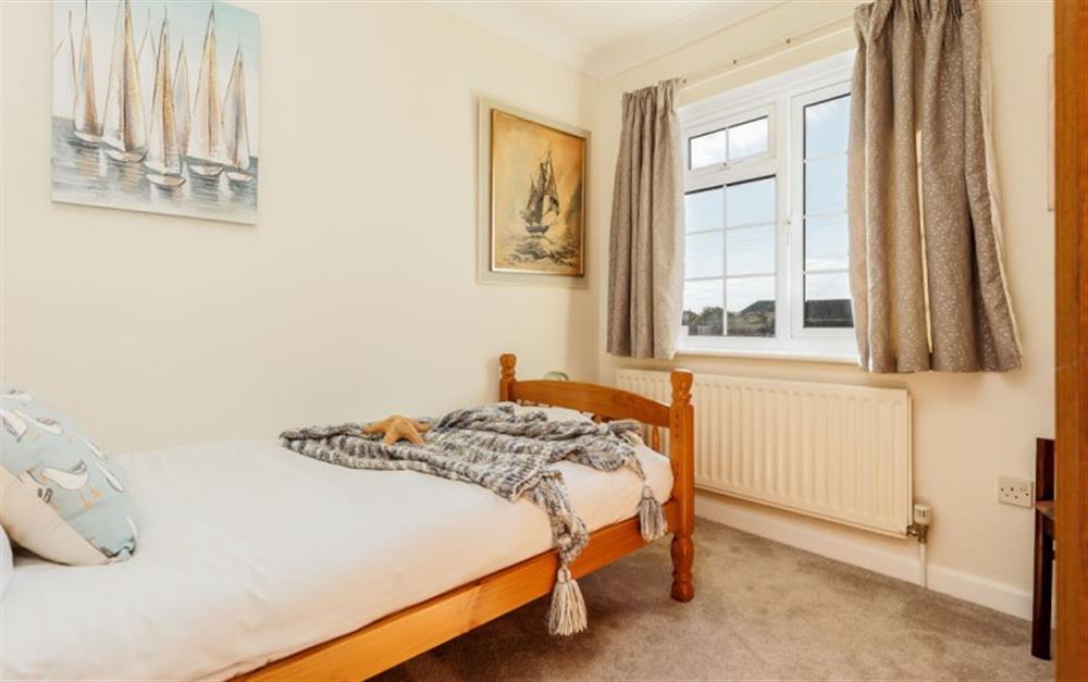 This is a bedroom (photo 4) at Dolphin Cottage in Barton On Sea