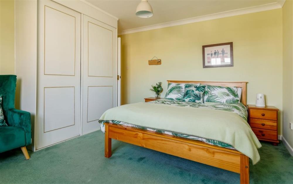 This is a bedroom at Dolphin Cottage in Barton On Sea