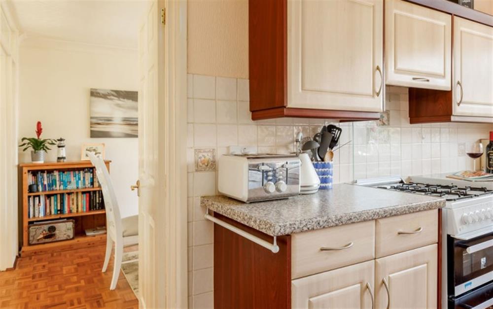 This is the kitchen (photo 2) at Dolphin Cottage in Barton On Sea