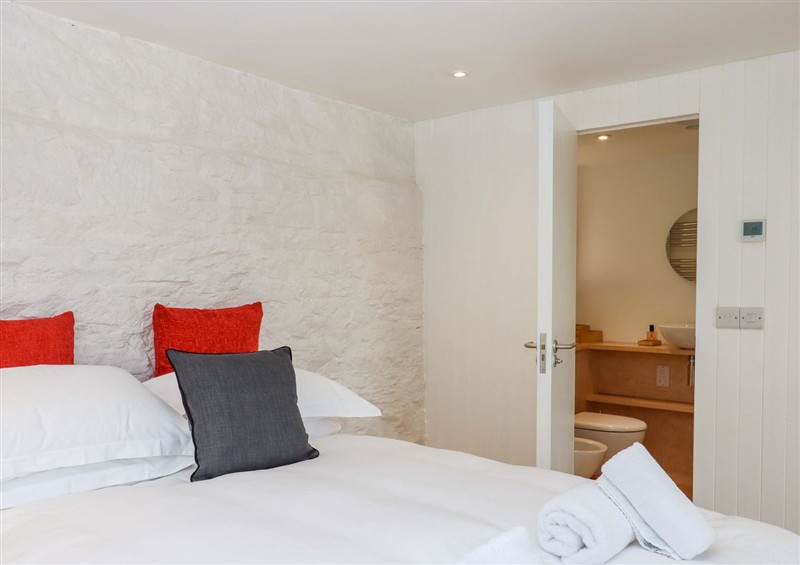 A bedroom in Dolphin Cottage at Dolphin Cottage, Galmpton