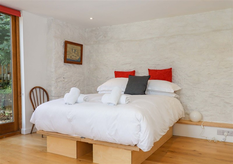 This is a bedroom at Dolphin Cottage, Galmpton