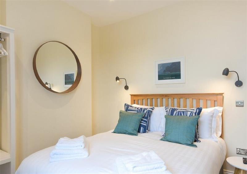 A bedroom in Dolphin Stone Lodge at Dolphin Stone Lodge, Seahouses