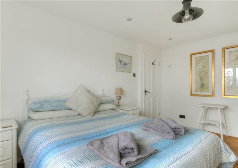 A bedroom in Dolphins Leap at Dolphins Leap, Charmouth
