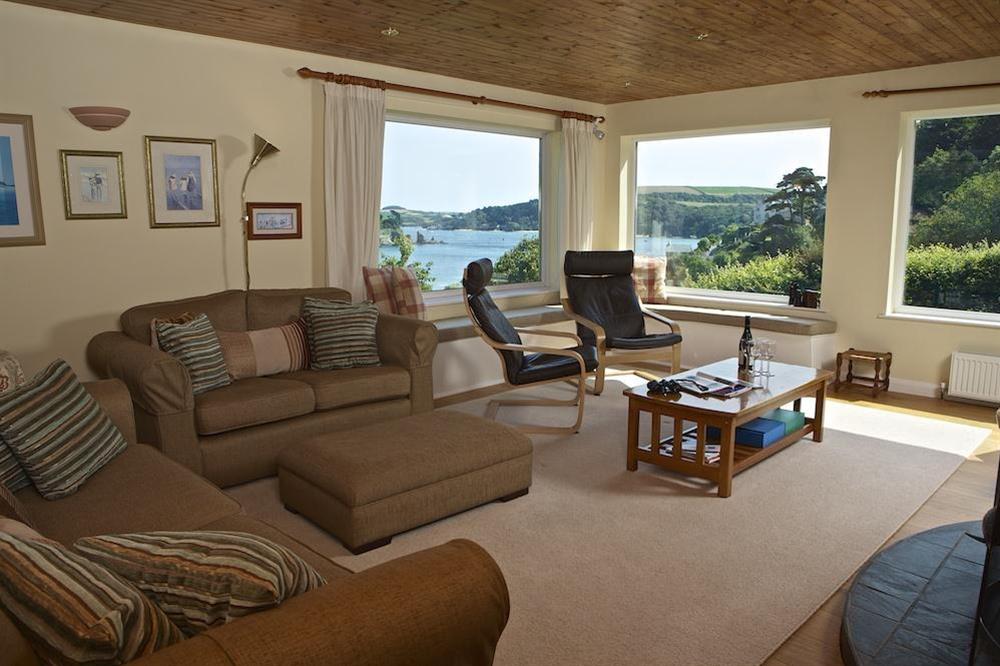 Lounge with window seats to enjoy the stunning sea views at Dolphins in South Sands, Salcombe