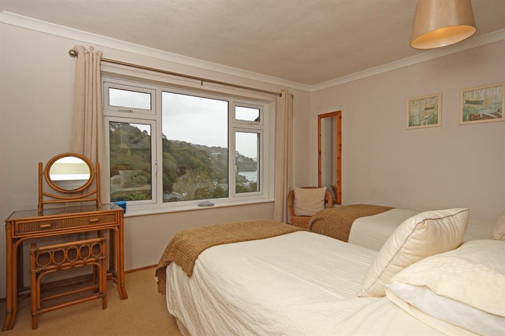 Twin bedroom with estuary views at Dolphins in South Sands, Salcombe
