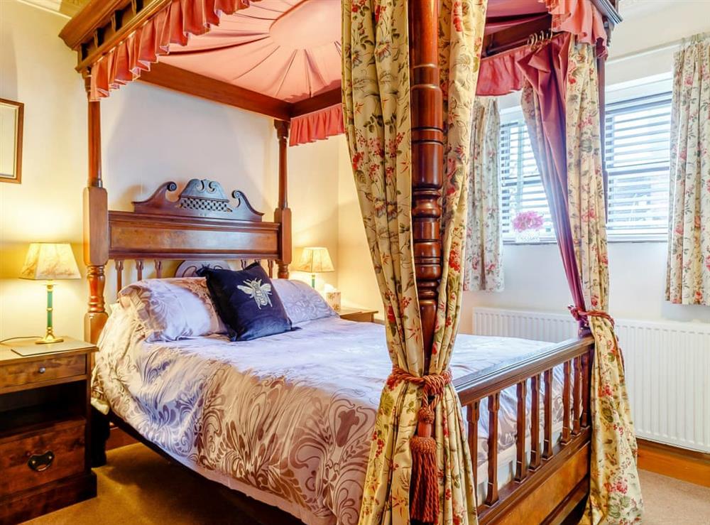 Four Poster bedroom (photo 2) at The Pigsty, 