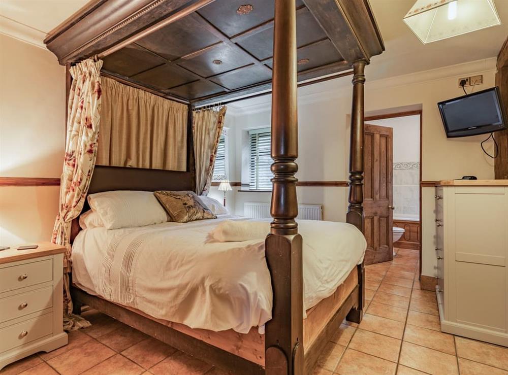 Four Poster bedroom (photo 4) at The Stable, 