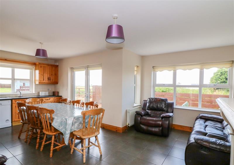 Living room and dining area at Doornogue, Churchtown near Fethard-on-Sea, Wexford