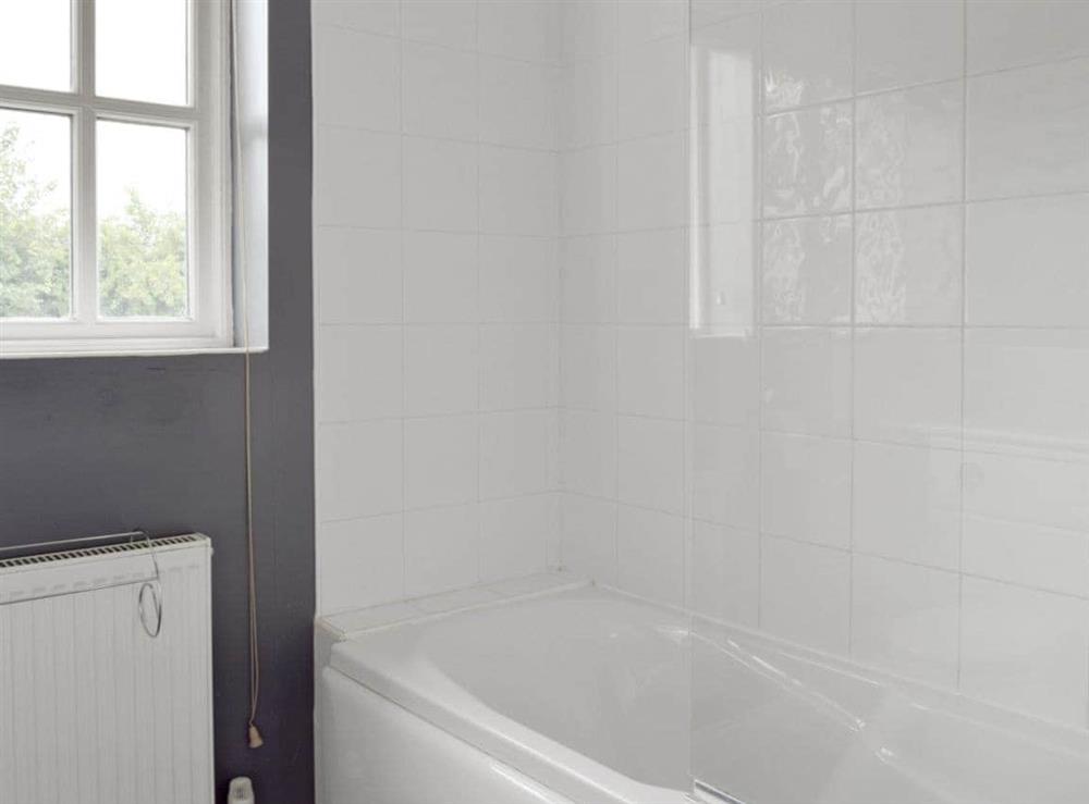 Family bathroom with shower over bath at Dormers in Leiston, Suffolk