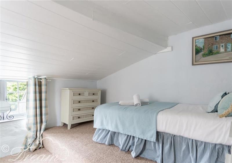 This is a bedroom at Dormouse Cottage, Burton Bradstock