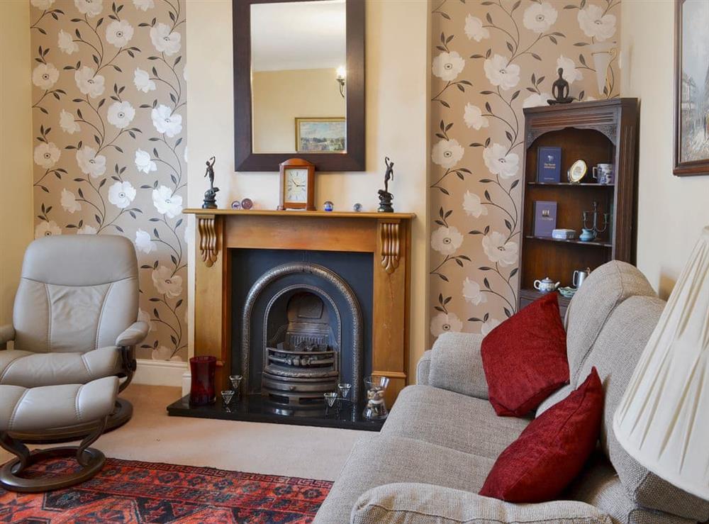 Cosy and welcoming living room at Dorothy’s Cottage in Torquay, Devon