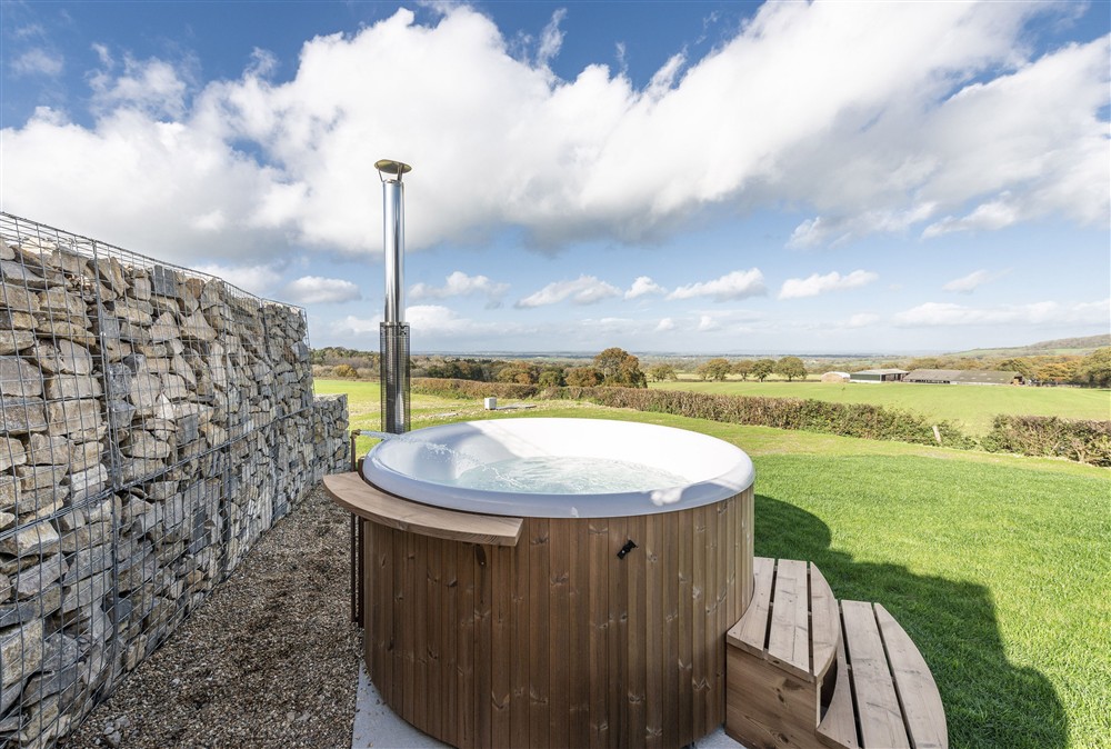 Each property has its own Skarsgard Scandinavian wood fired hot tub at Dorset Eco Retreats, Ansty, Dorchester