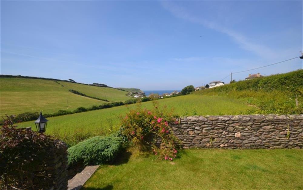 The view from the conservatory and upper part of the garden at Double Gates in Hope Cove
