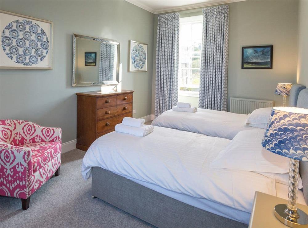 Generous sizedtwin bedroom at The House of Machrie, 