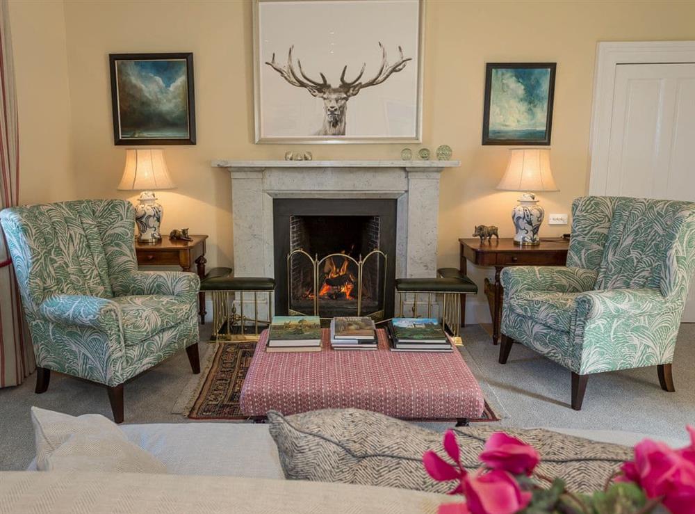 Impressive drawing room with open fire (photo 2) at The House of Machrie, 
