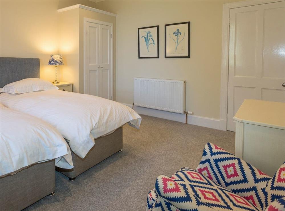 Relaxing twin bedroom at The House of Machrie, 