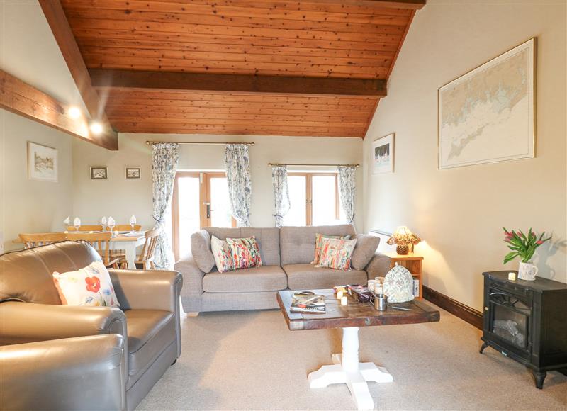Relax in the living area at Dove Cottage, Grindon near Waterhouses