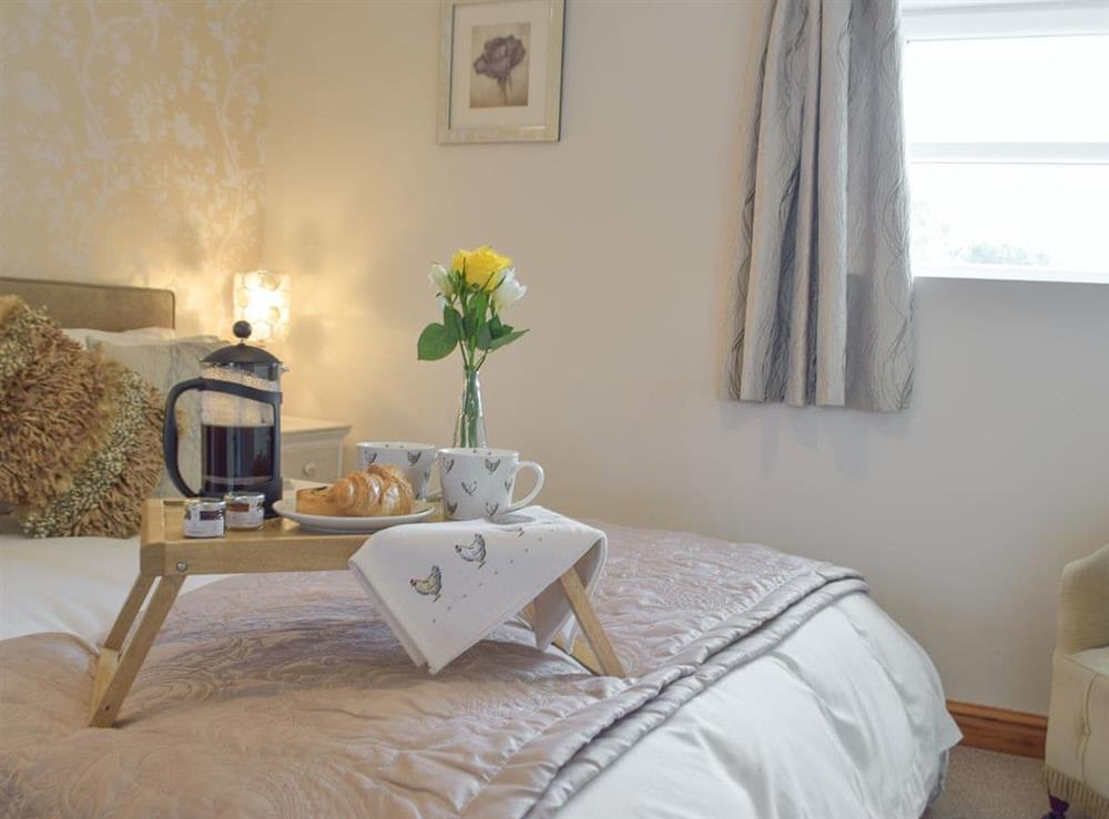Comfortable double bedroom at Dove Cottage in Pontyates, near Kidwelly, Dyfed