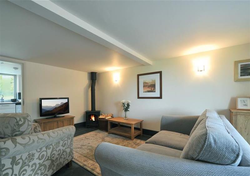 Relax in the living area at Dove Tail Barn, Kendal