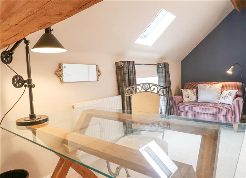 Enjoy the living room at Dovecote Cottage, Alkmonton near Ashbourne